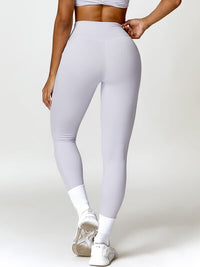 Thumbnail for Twisted High Waist Active Leggings with Pockets - T - 5 COLORS -