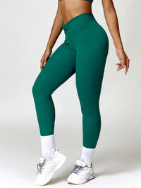 Thumbnail for Twisted High Waist Active Leggings with Pockets - T - 5 COLORS -