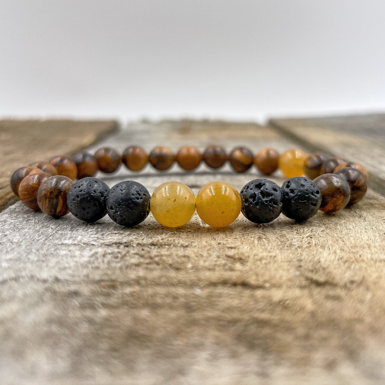 Central - Orange, Lava Rock, & Golden Sandalwood -