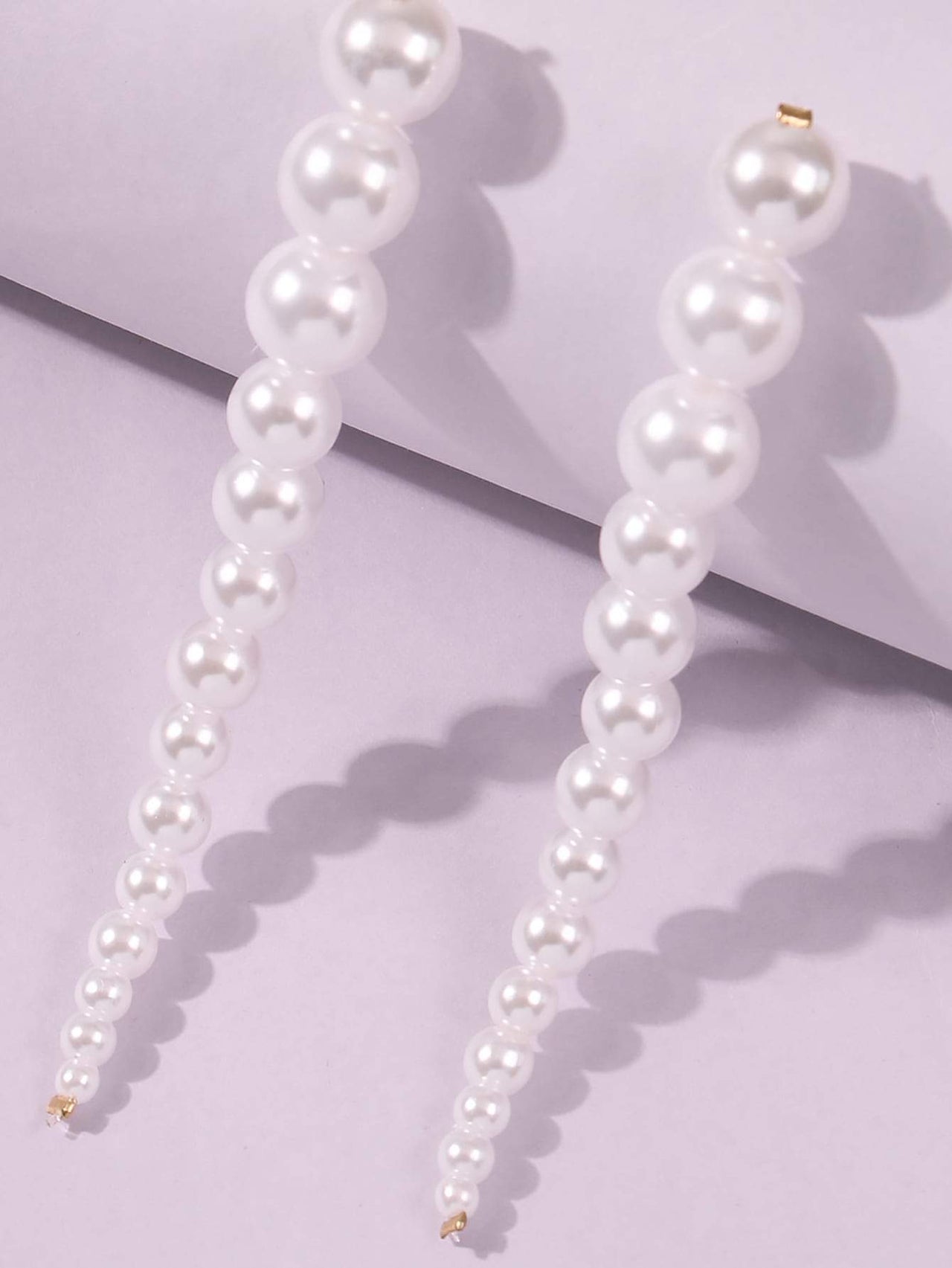 BCNY - Elegant Line of Pearl Drop Earrings -