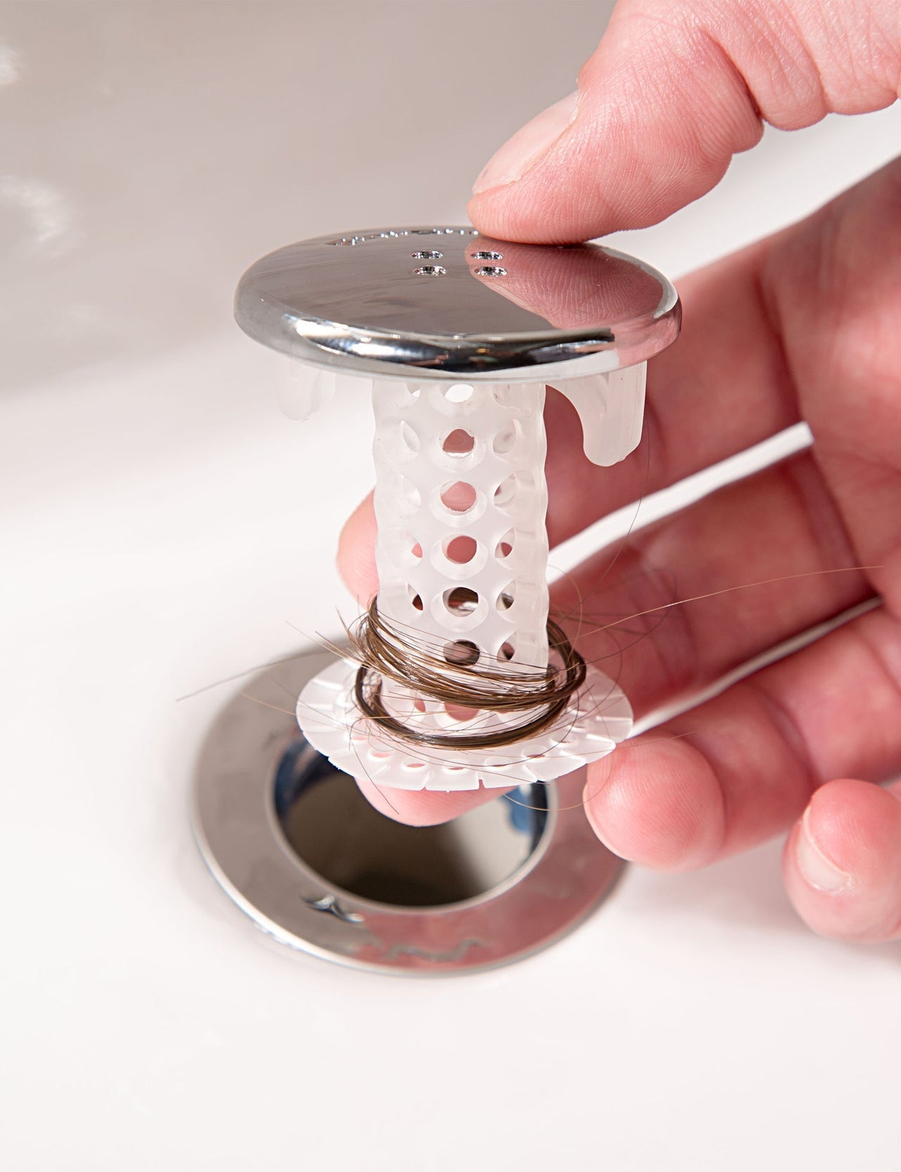 SinkShroom (Chrome Edition) the Hair Catcher That Prevents Clogged Bathroom Sink Drains