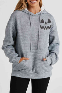 Thumbnail for Pumpkin Face Graphic Drawstring Hoodie with Pocket - T - 1 COLOR -