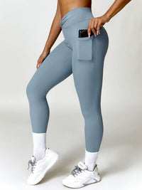 Thumbnail for Twisted High Waist Active Leggings with Pockets - T - 5 COLORS -